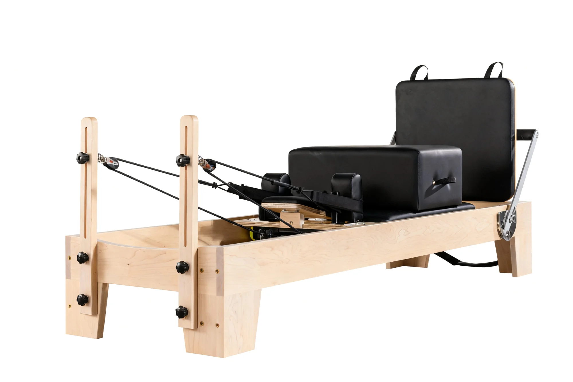 Alaya Maple Wood Reformer Pilates machine, showing the full frame and upholstered carriage